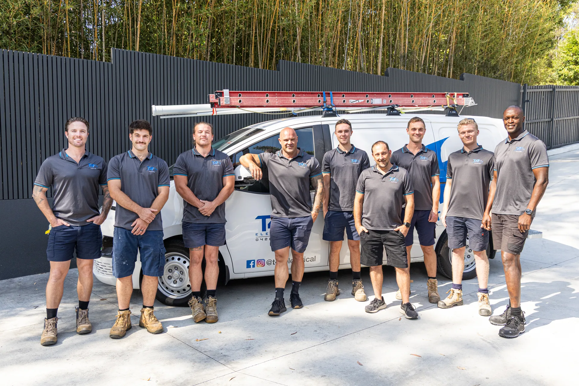 The Family Electrician Pimpama team with a service van